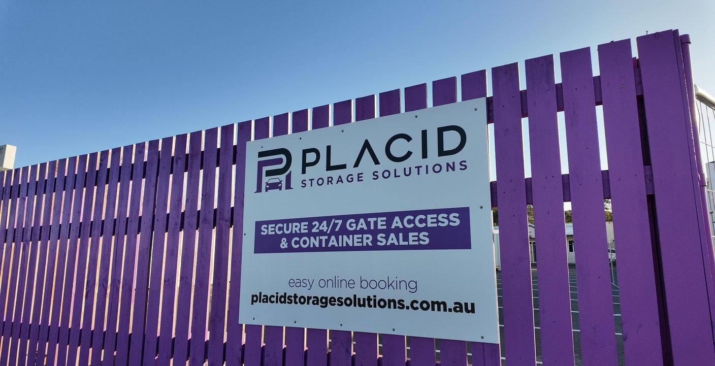 The purple fence and sign at Placid Storage Solutions, 27 Toolooa Street, South Gladstone